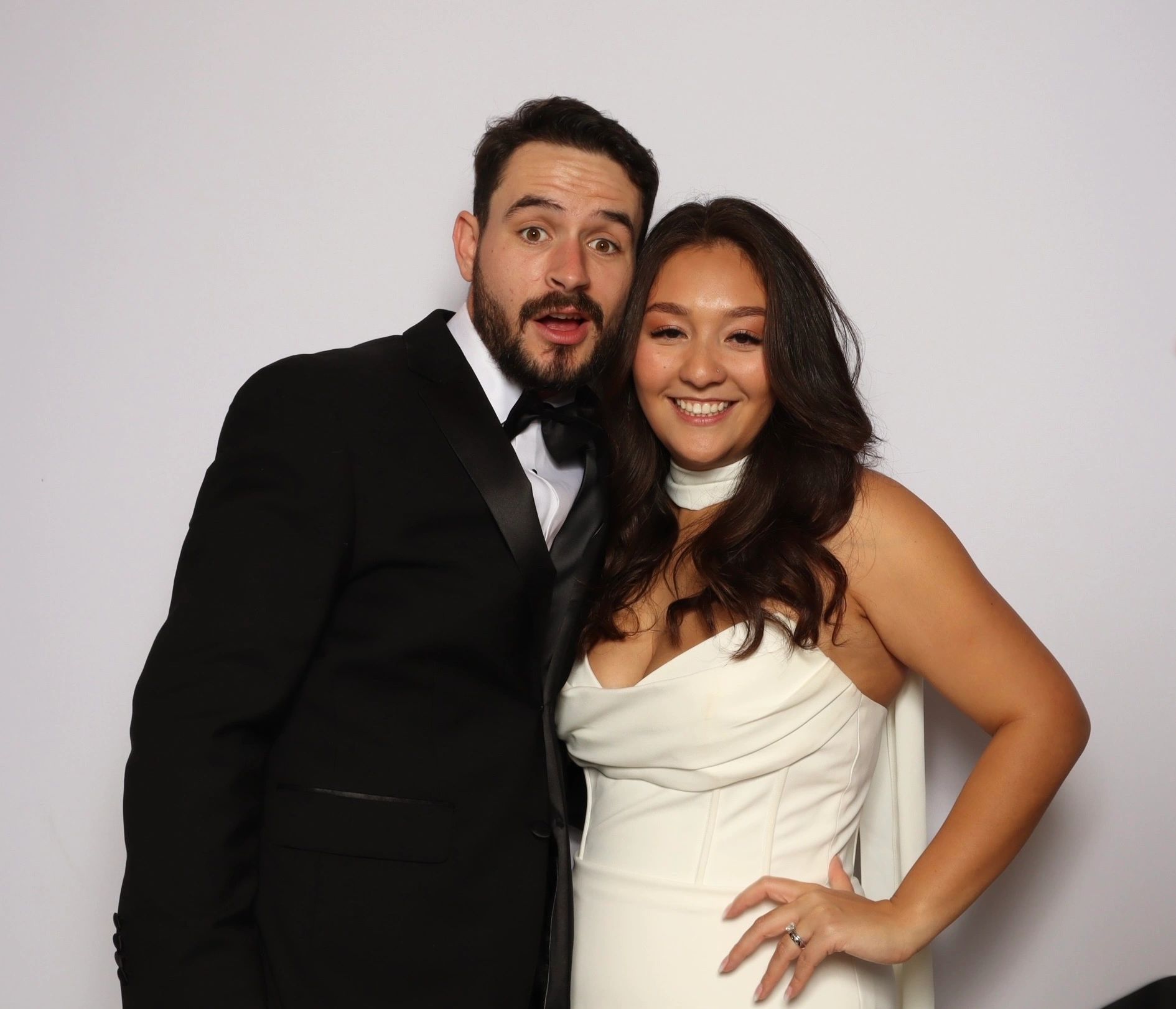 Joshua and Marcella celebrating during their elegant wedding reception in Boerne, Texas with a luxur