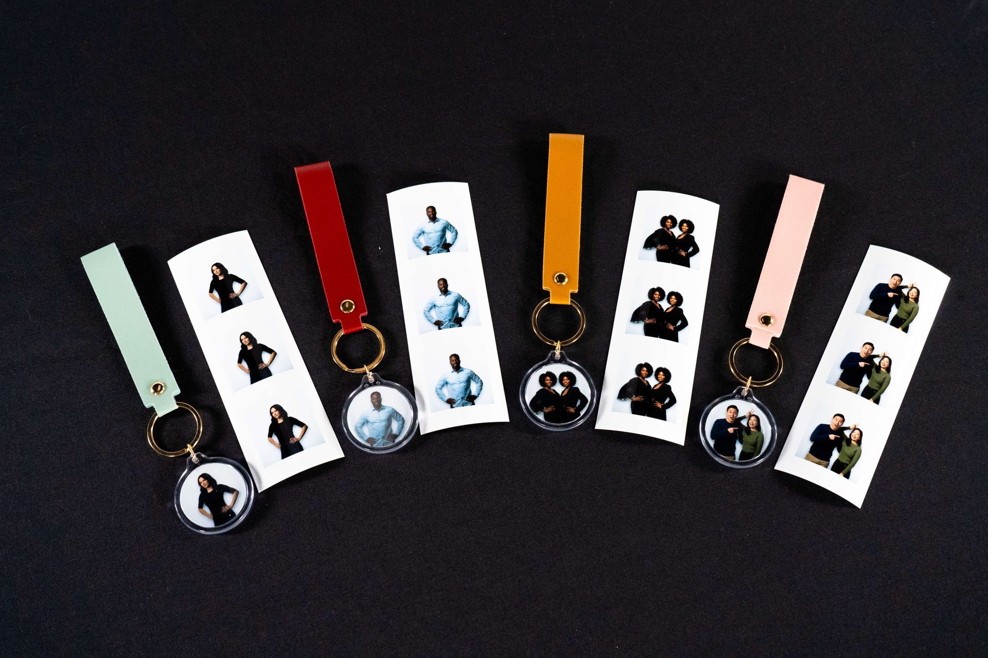 Custom photo keychain wedding favors featuring personalized portraits, elegant leather straps, and gold key rings displayed on a black background — a unique, keepsake guest favor option for weddings and special events.