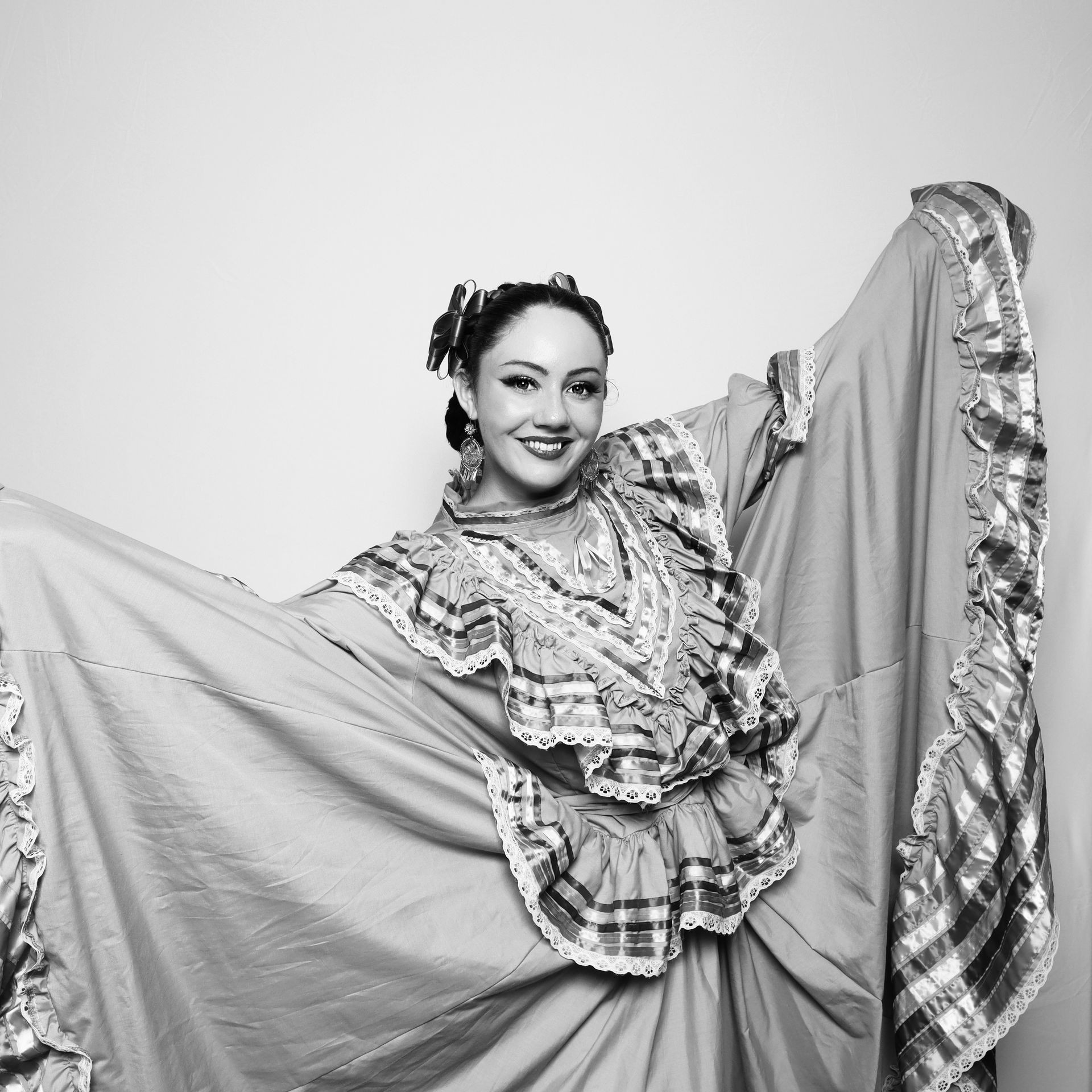 High-contrast glam photo booth headshot with professional studio lighting