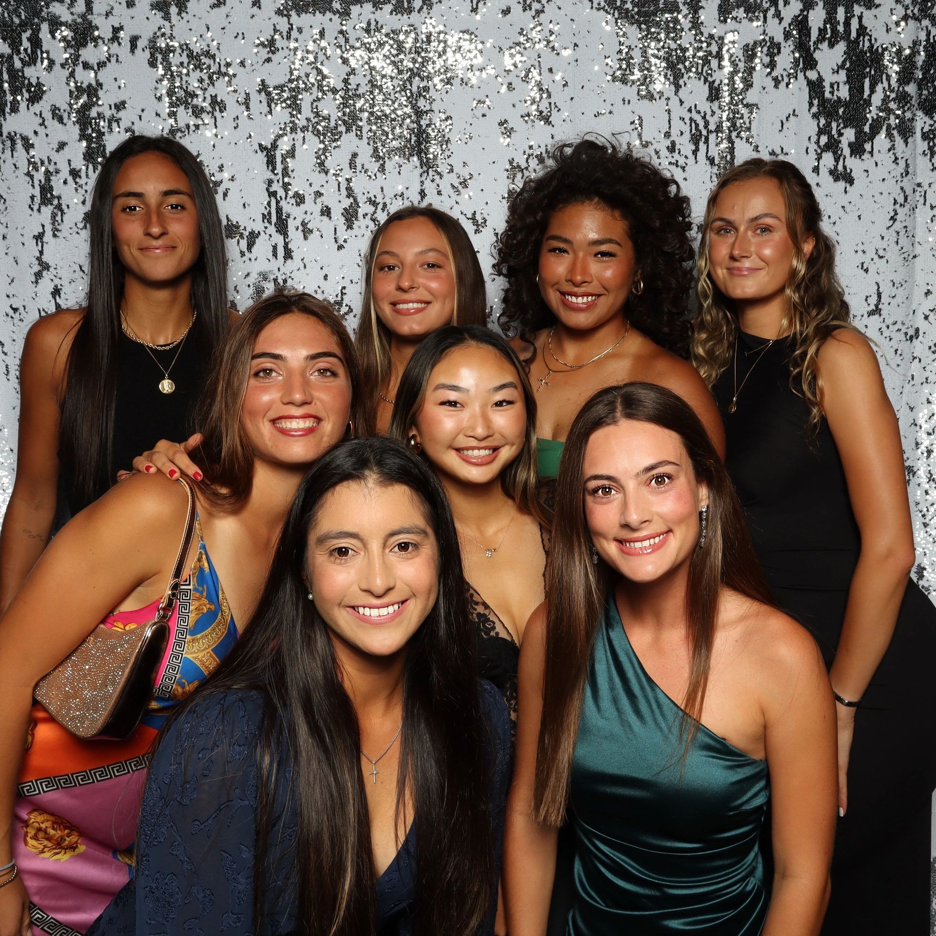 High-energy party guests using interactive digital photo booth