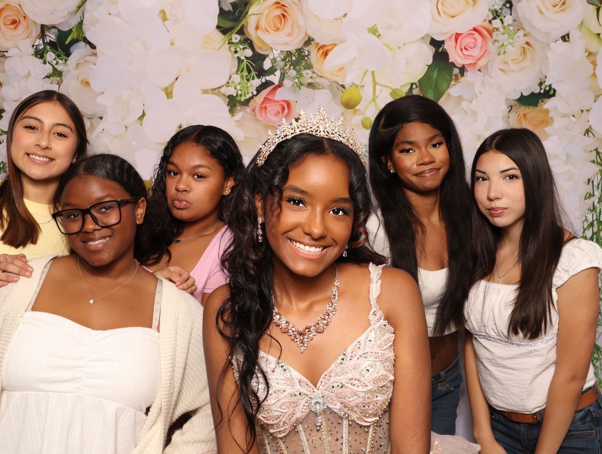 Sweet 16 party photo booth with instant printed photo strips