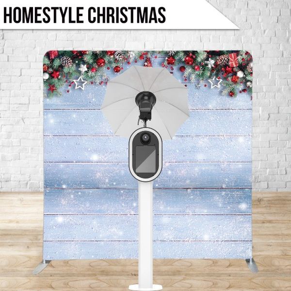 A homestyle christmas photo booth with a wooden background