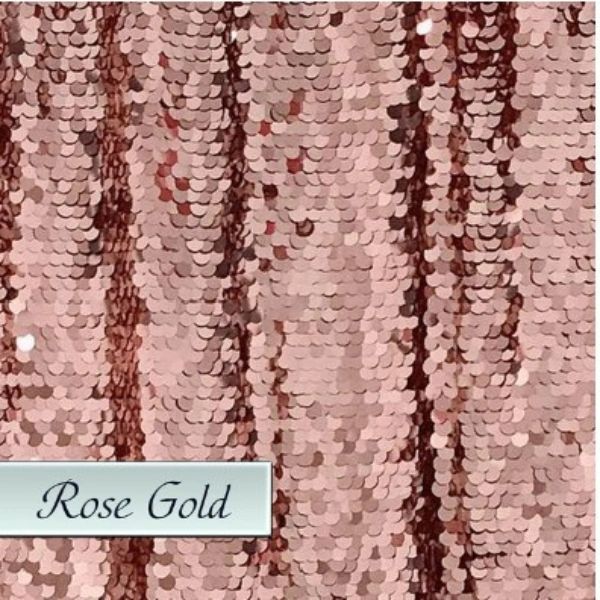 A close up of a rose gold sequined fabric