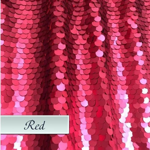 A close up of a red sequined fabric