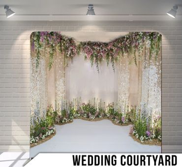 A wedding courtyard with flowers hanging from the ceiling