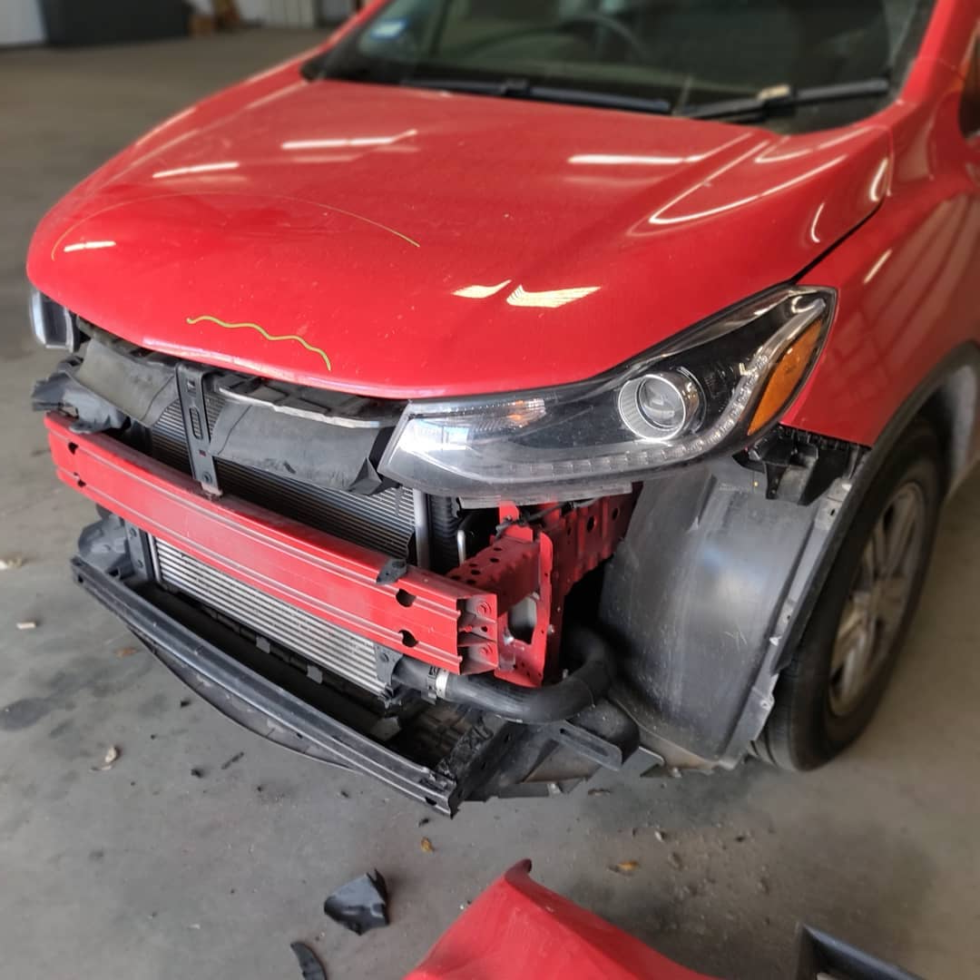 collision repair before on red suv