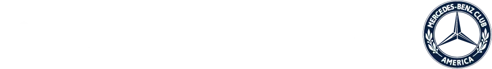 Audi logo in a light-colored, blurred background.