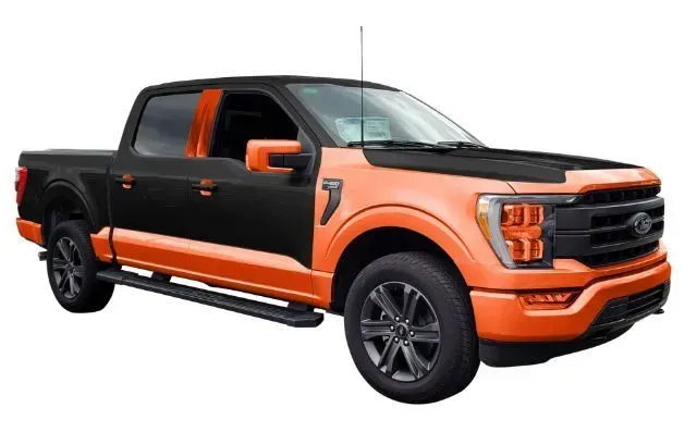 A black and orange ford f150 truck on a white background.