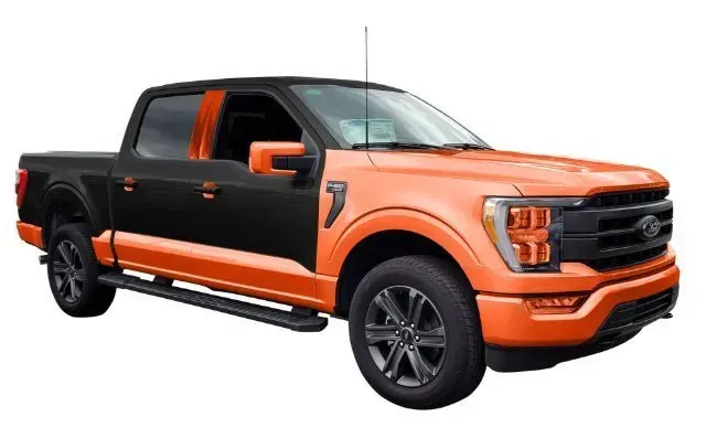 A black and orange ford f150 truck on a white background.