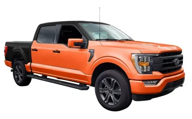 An orange and black ford f150 truck is shown on a white background.
