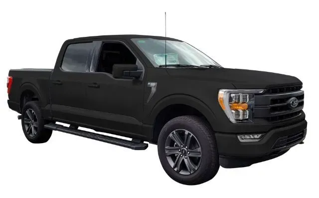 A black ford f150 truck is shown on a white background.