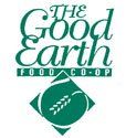 The good earth food coop logo is a green logo with a wheat icon.