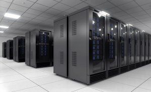 floor to ceiling black steel cases for electronics in a data centre on white tiles