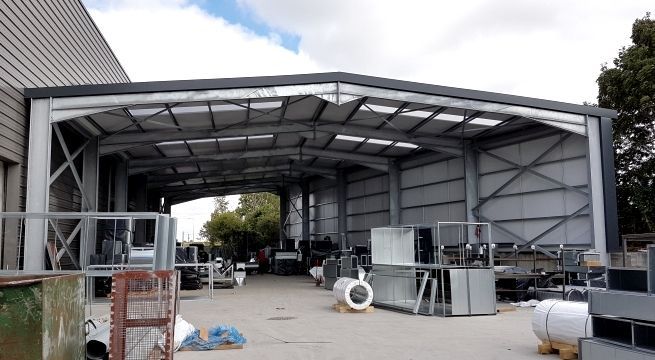 outside view of steel frame of 45,000 sq. ft. expanded manufacturing floor area in 2016