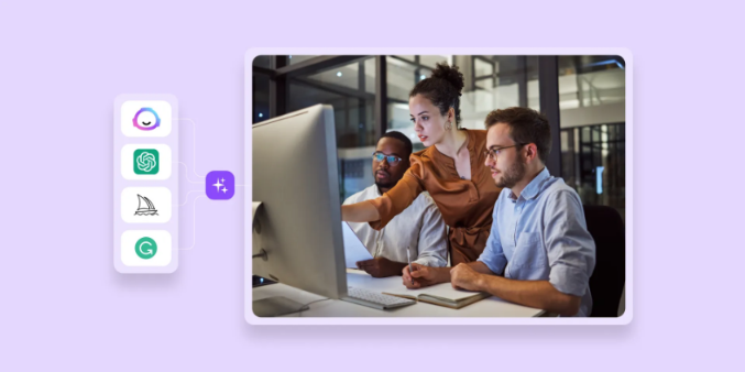 two guys and a girl working in front of a computer