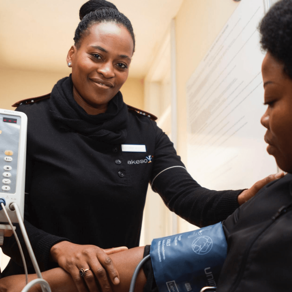 Medical staff helping patient 