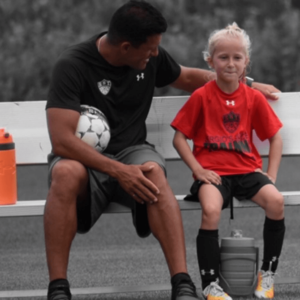 Sergio sitting with a player