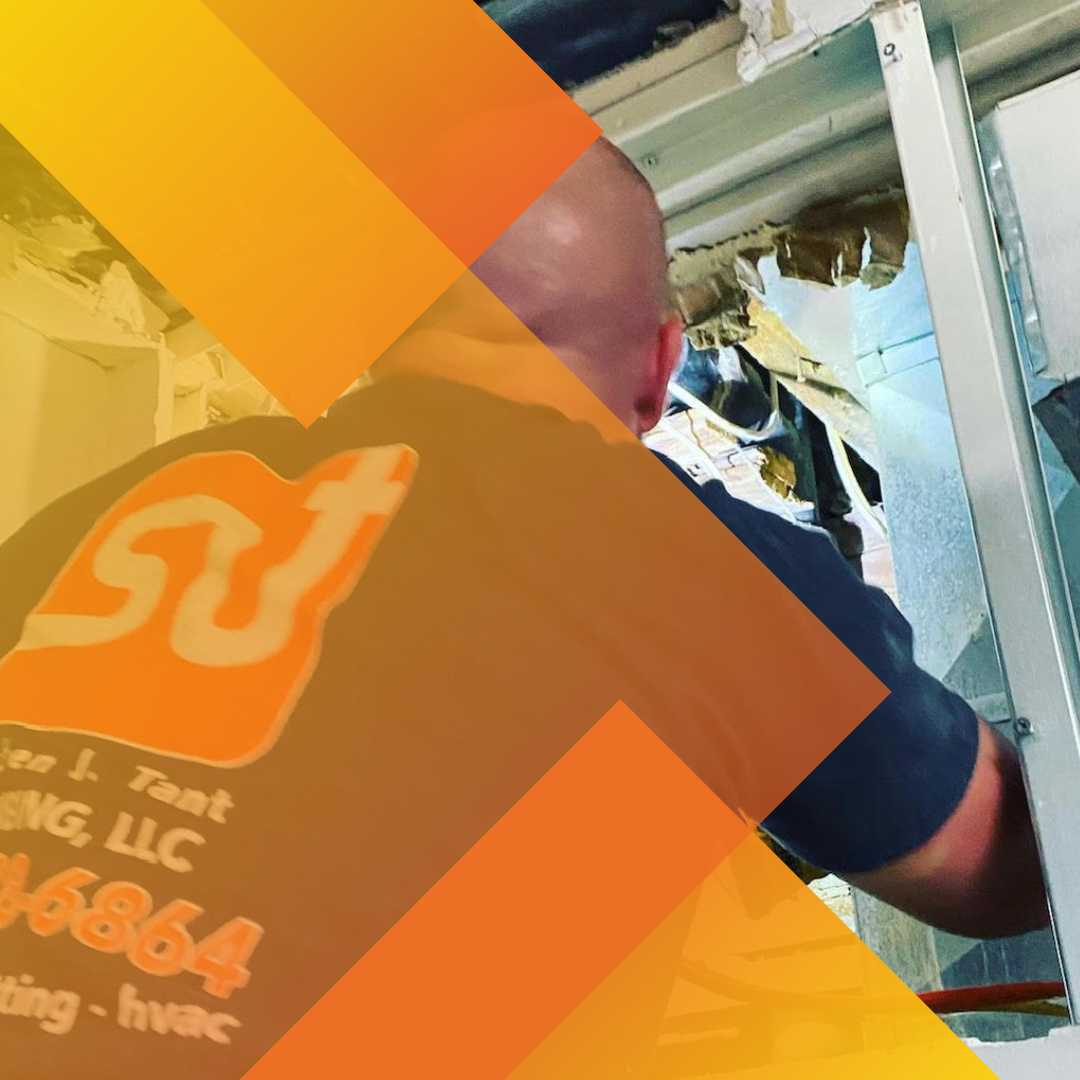 SJT Plumbing Employee on a service call