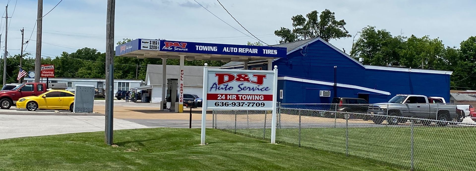 A gas station with a sign that says pat on it