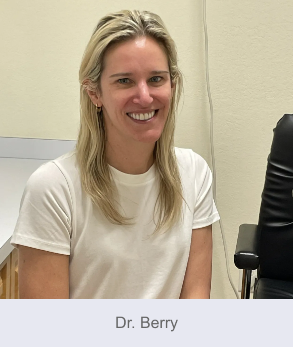 Woman with blonde hair smiling, wearing a white shirt; identified as Dr. Berry.