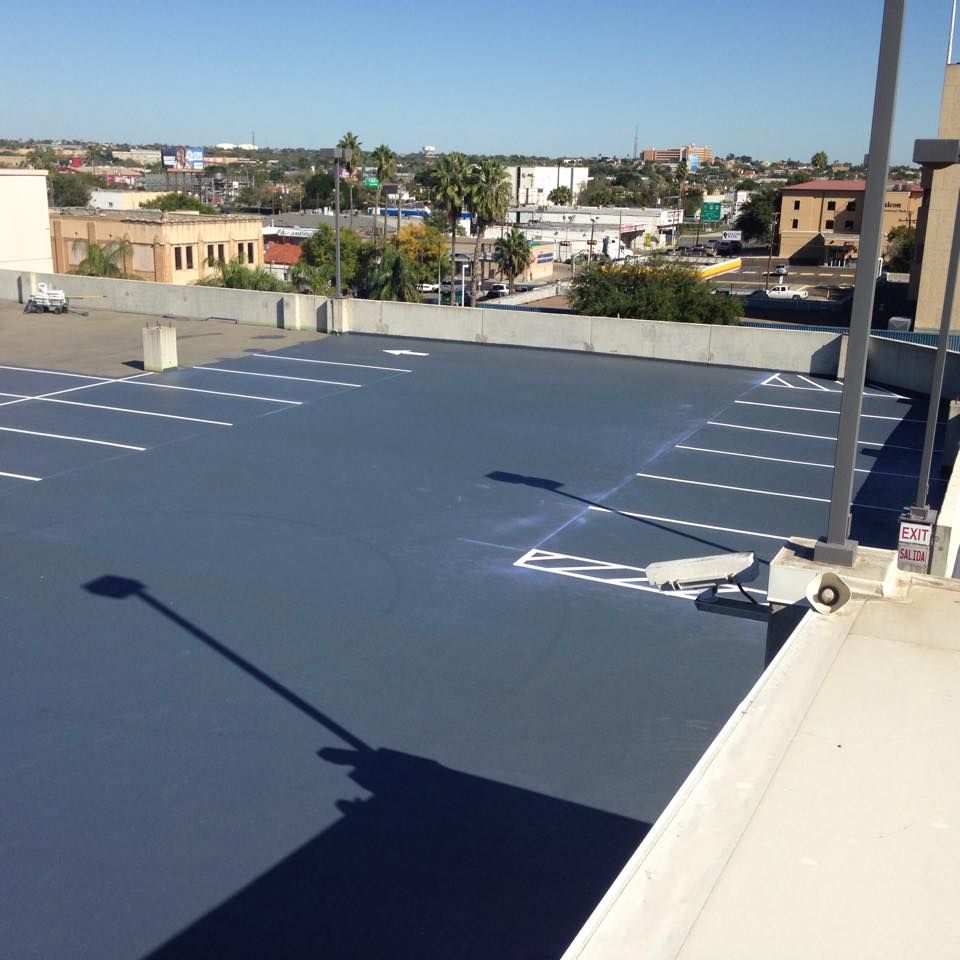 A parking lot with a sign that says no parking