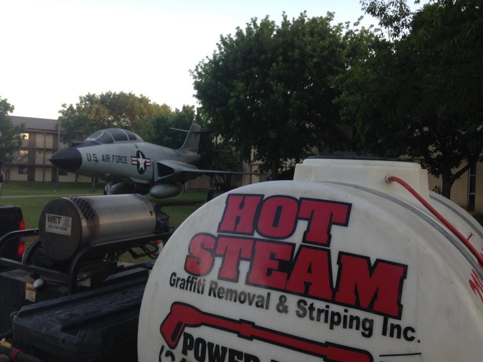 A hot steam graffiti removal and striping inc. tank