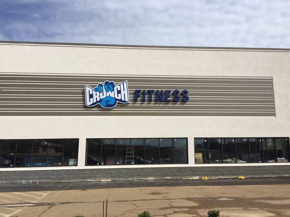 Crunch Fitness gym exterior with blue logo.