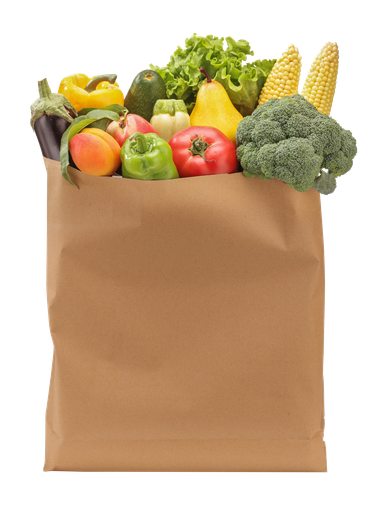 A paper bag filled with fruits and vegetables on a white background