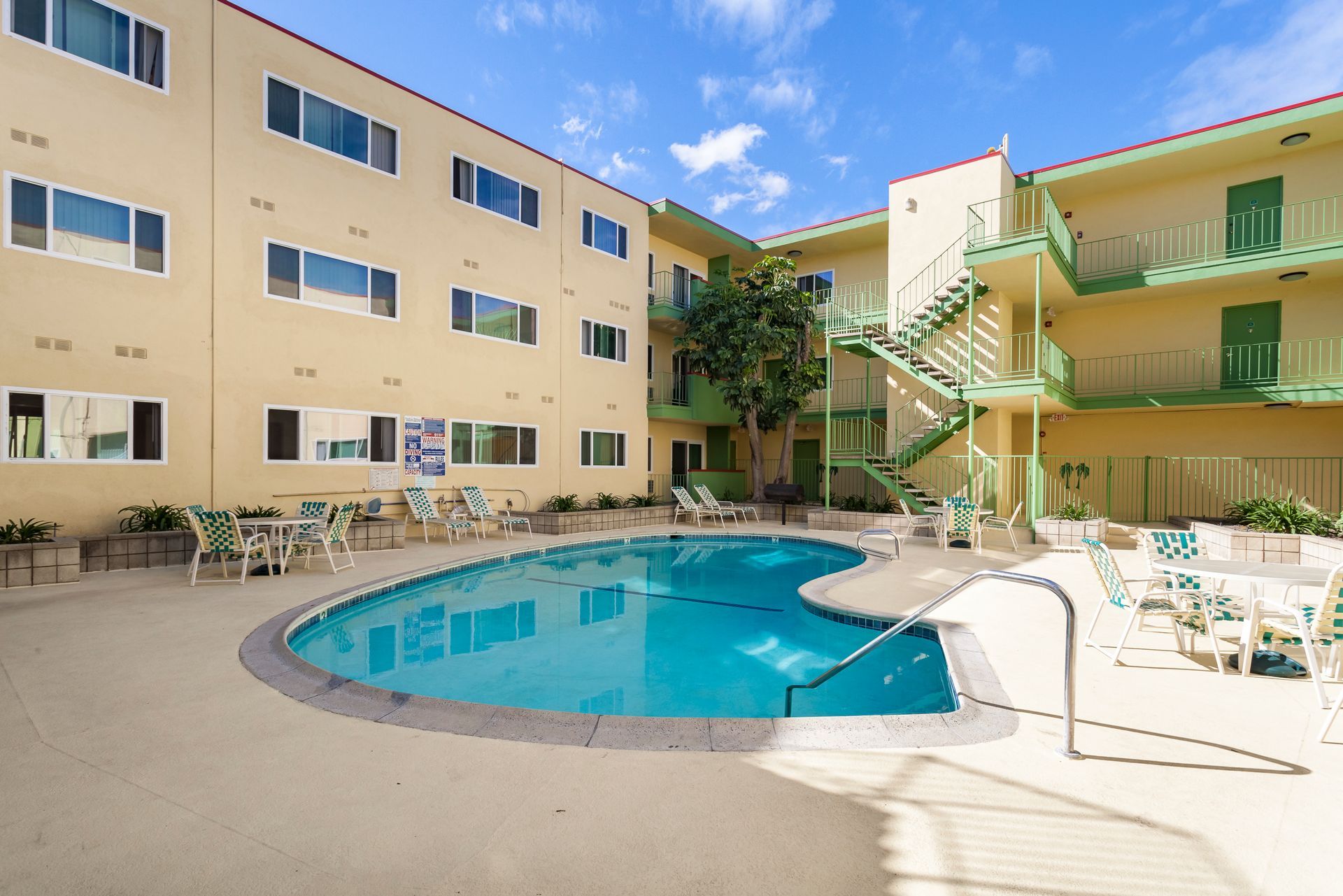 A large swimming pool in the middle of a building