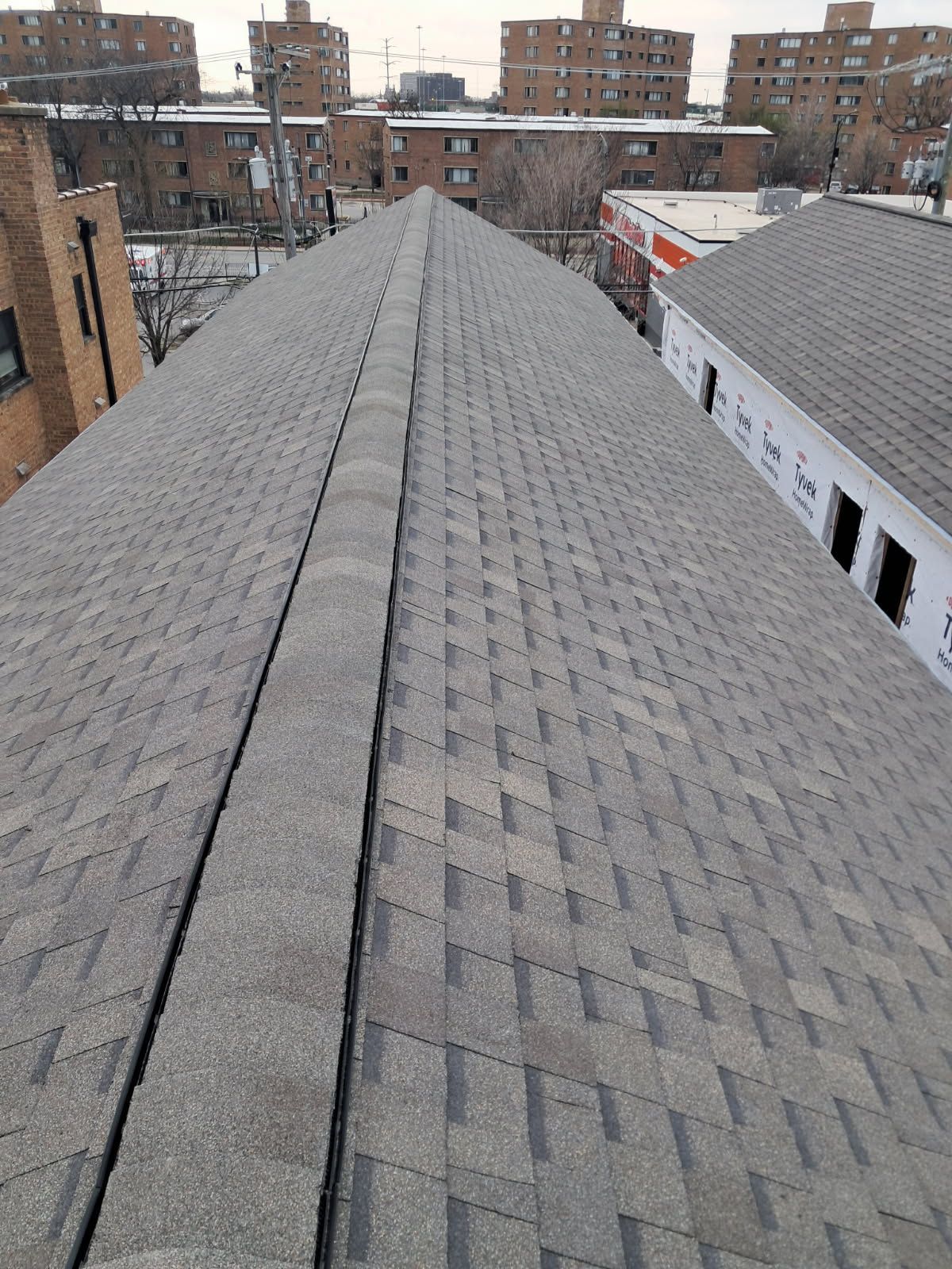 The roof of a building with a lot of shingles on it.