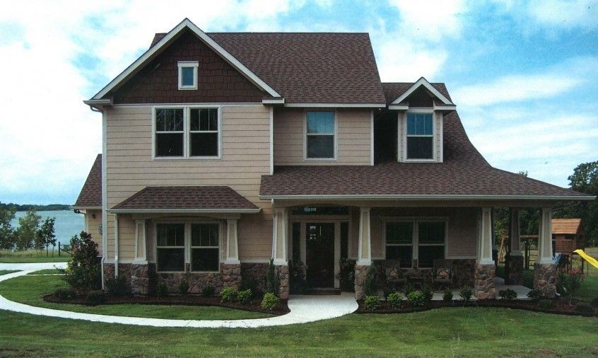 A large house with a walkway leading to it