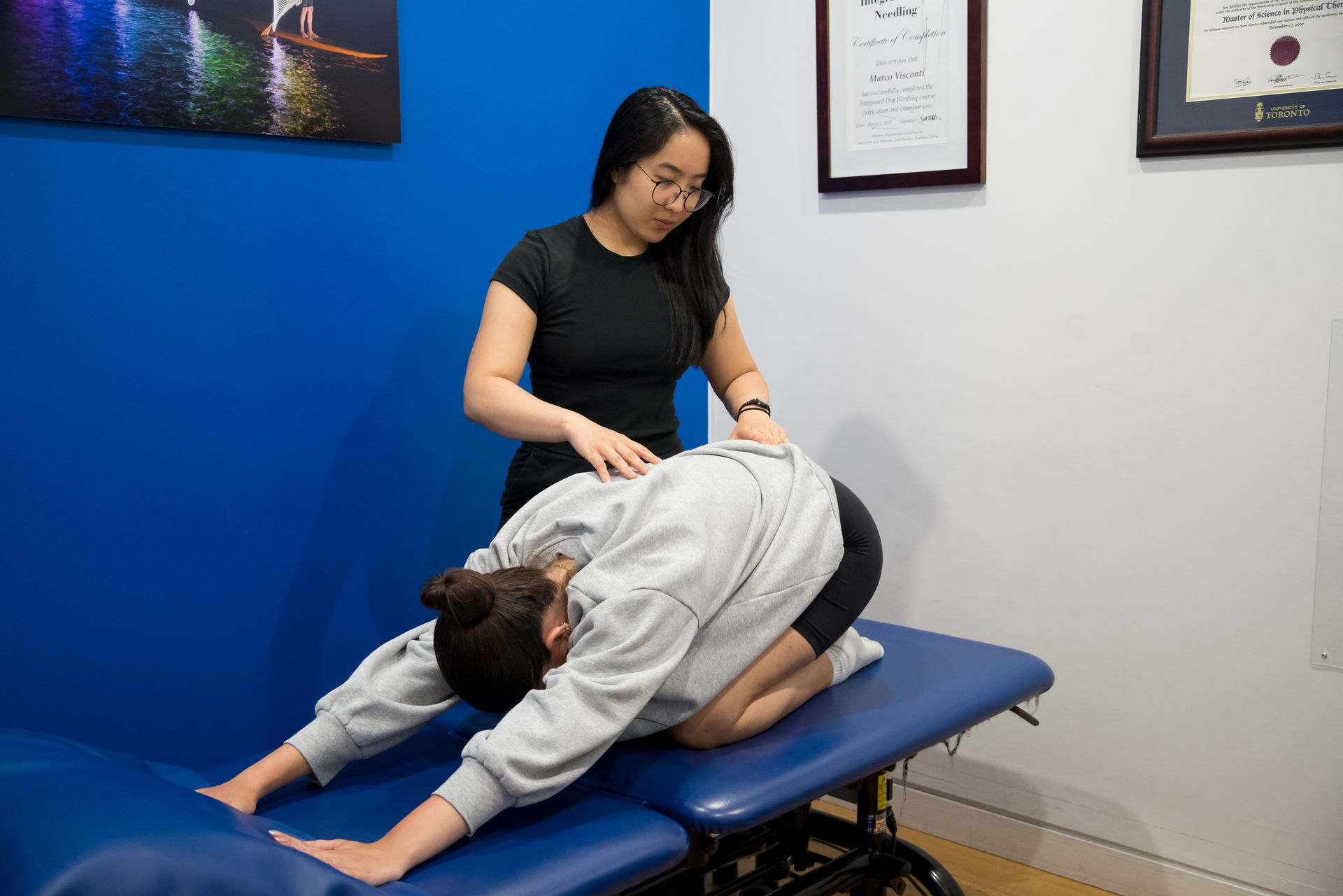 woman receiving physiotherapy treatment