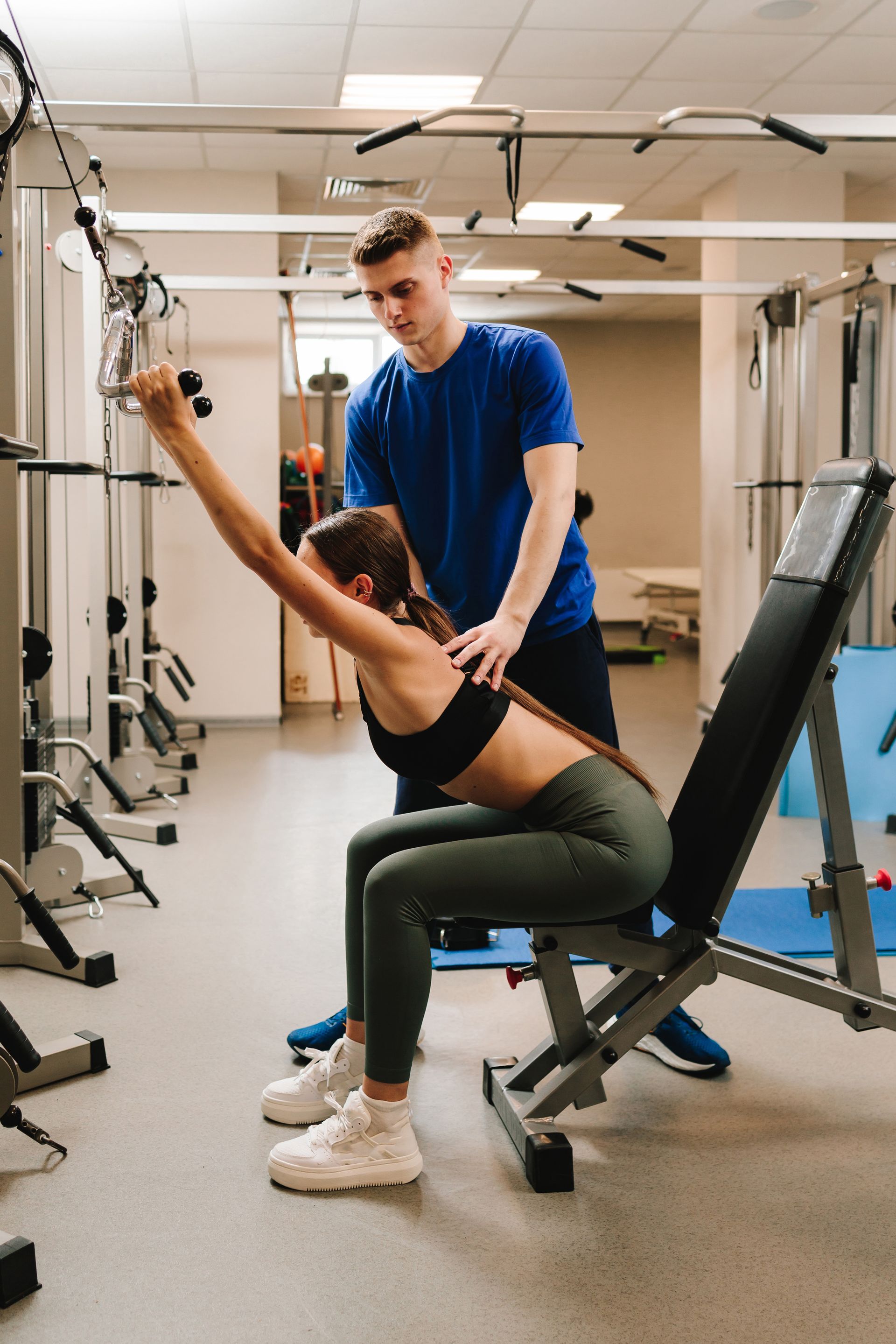 physiotherapist helping patient 