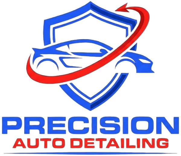 Logo for Precision Auto Detailing. Blue car silhouette inside a blue shield, encircled by a red arc.