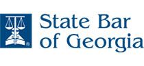 The state bar of georgia logo has a scale of justice on it.