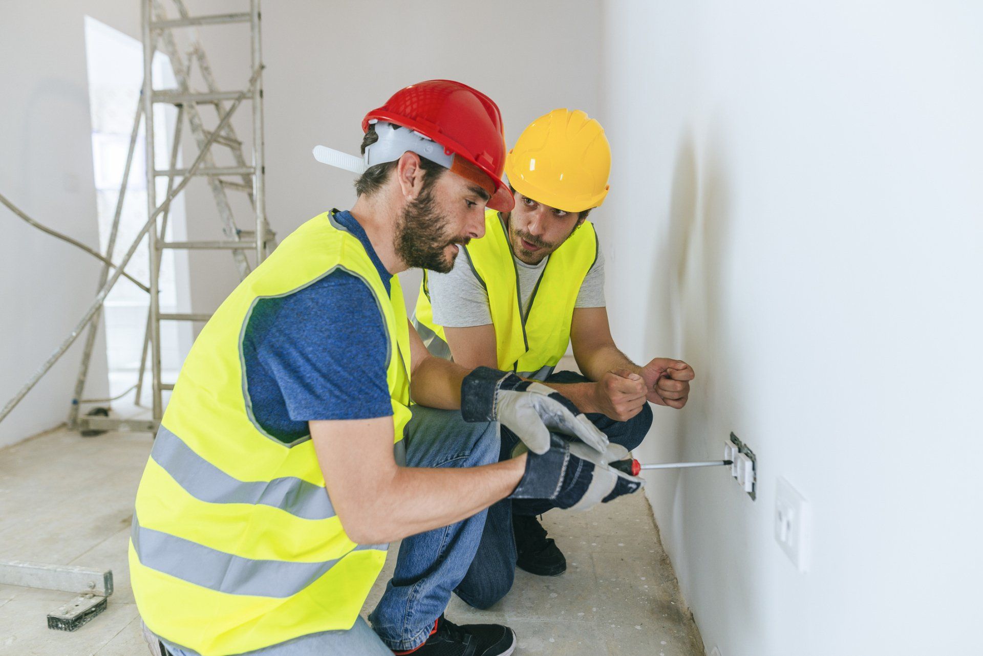 Two Electricians Fixing Outlet – Oklahoma City, OK – B & R Electric
