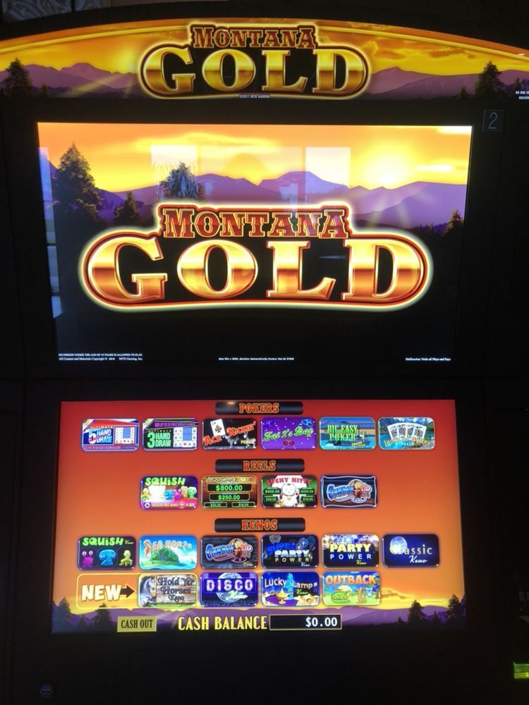 A montana gold slot machine with mountains in the background
