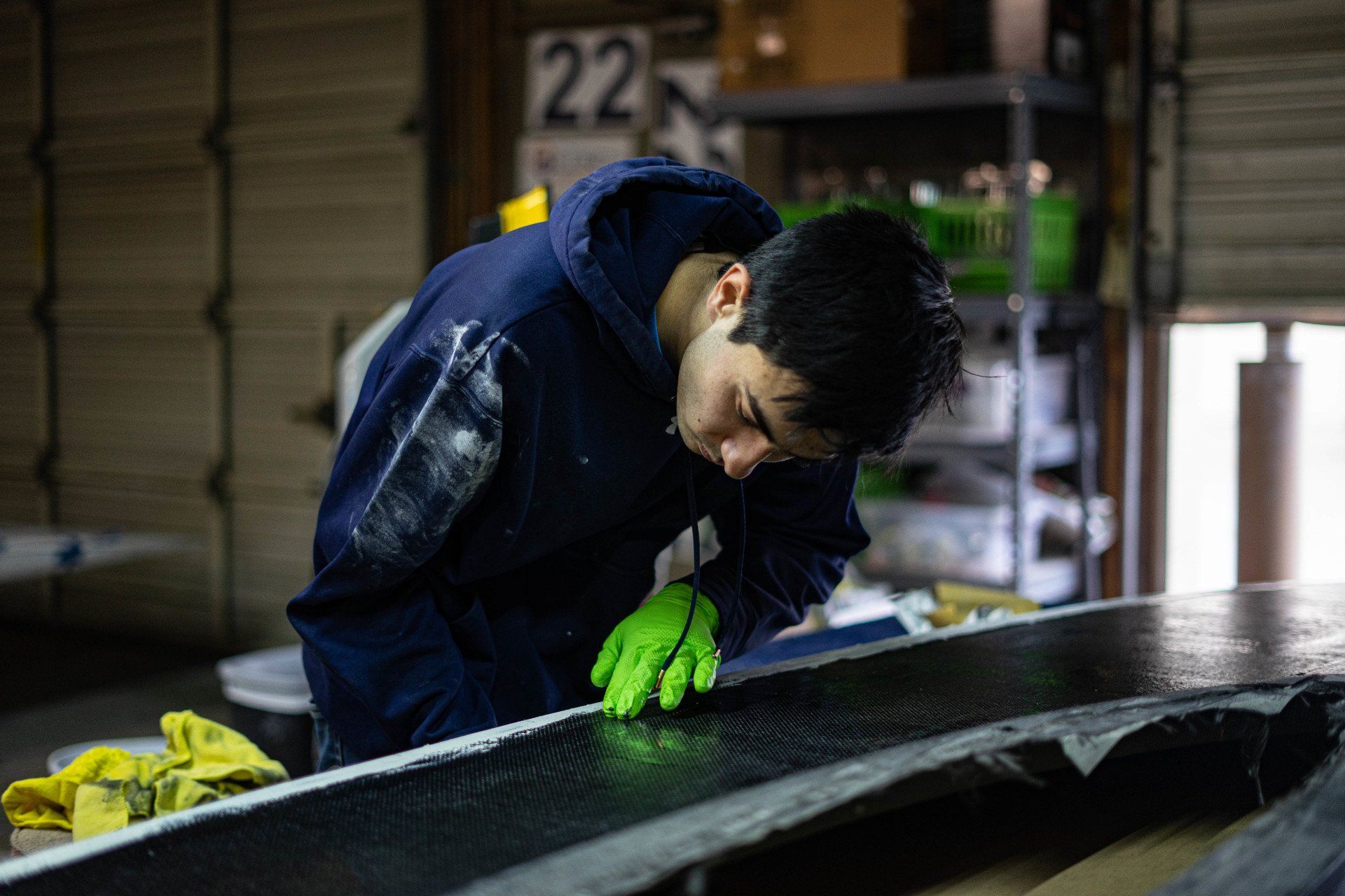 John examines some carbon fiber.