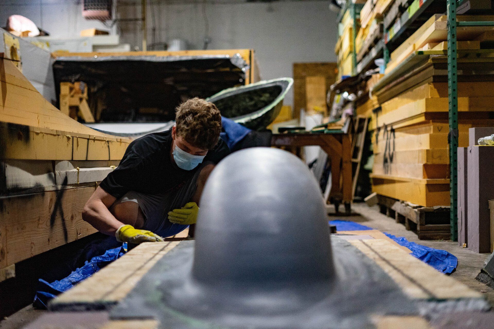 Peter works on the canopy mold.