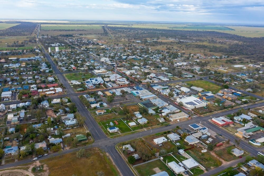 An Aerial View of A Small Town with Lots of Houses and Streets — Radburn Carpentry in Manilla, NSW