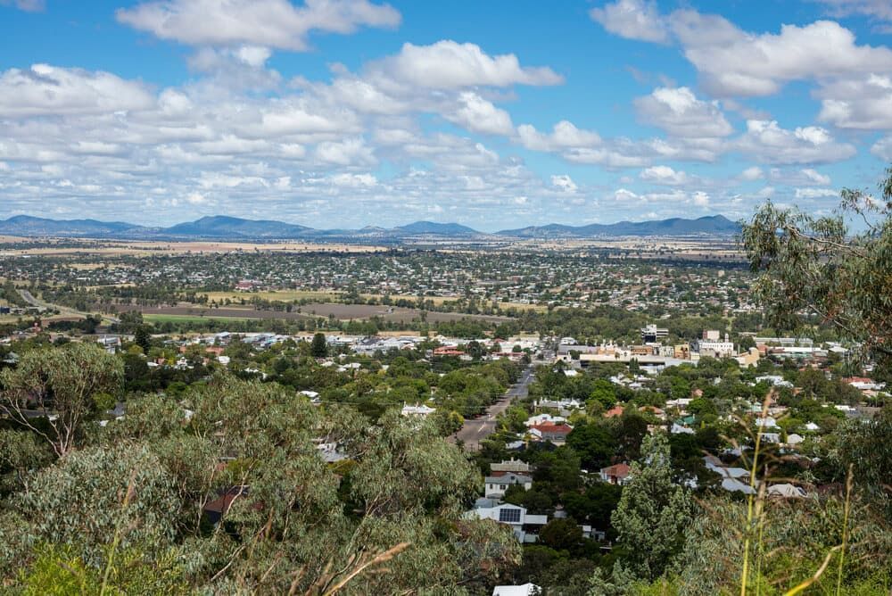 A View of A City from A Hill with Mountains in The Background — Radburn Carpentry in Manilla, NSW