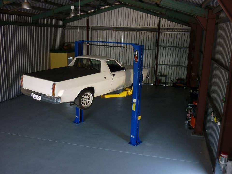 A White Pick-up Truck Inside the Garage — Mechanical Repairs in Bundaberg, QLD