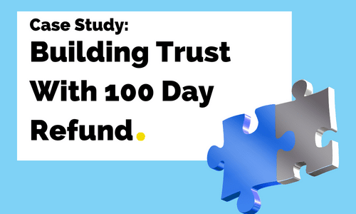 A blue puzzle piece is sitting next to a white sign that says building trust with 100 day refund.