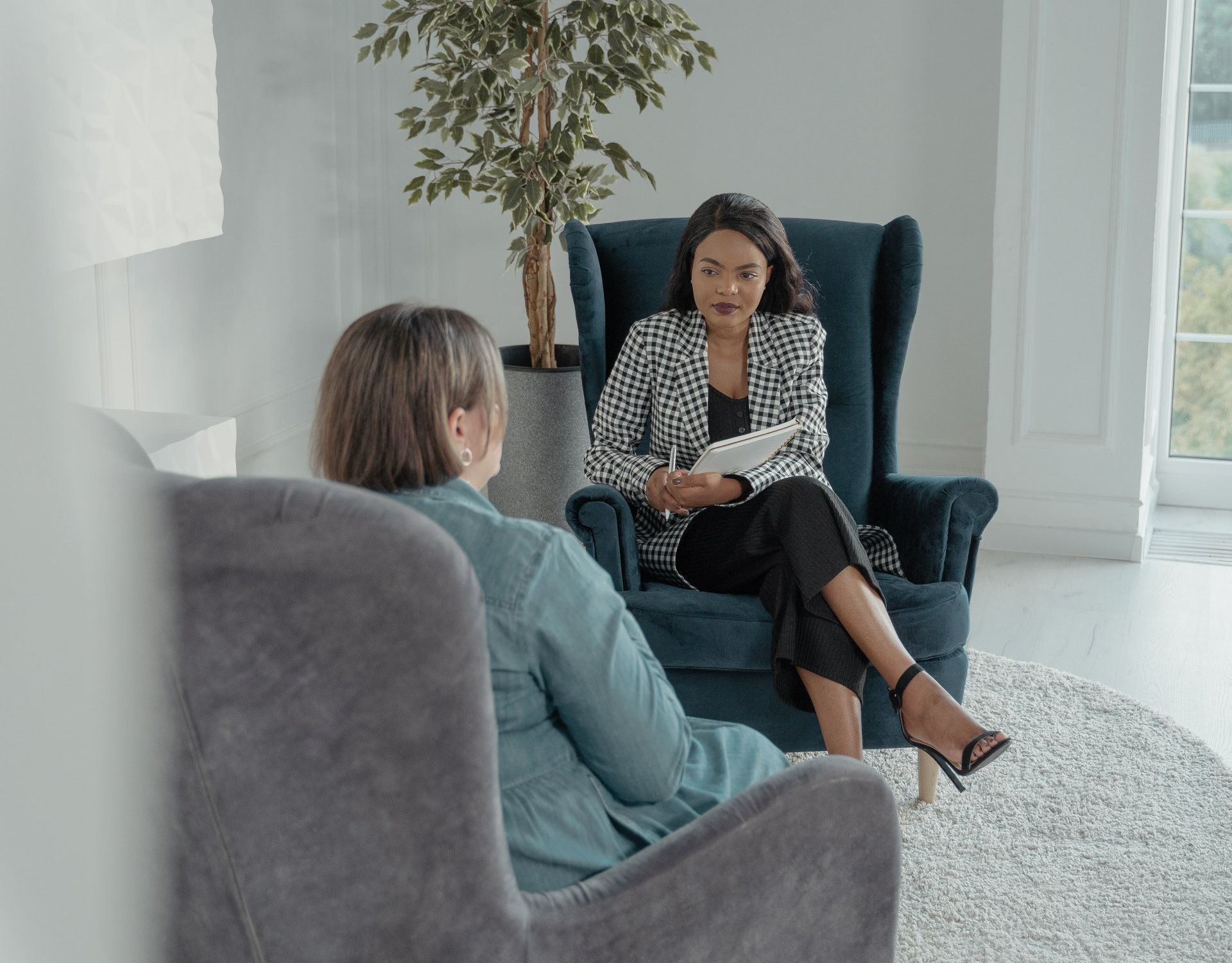 A pair of binoculars sitting next to a sign that says `` first job interview advice ''.