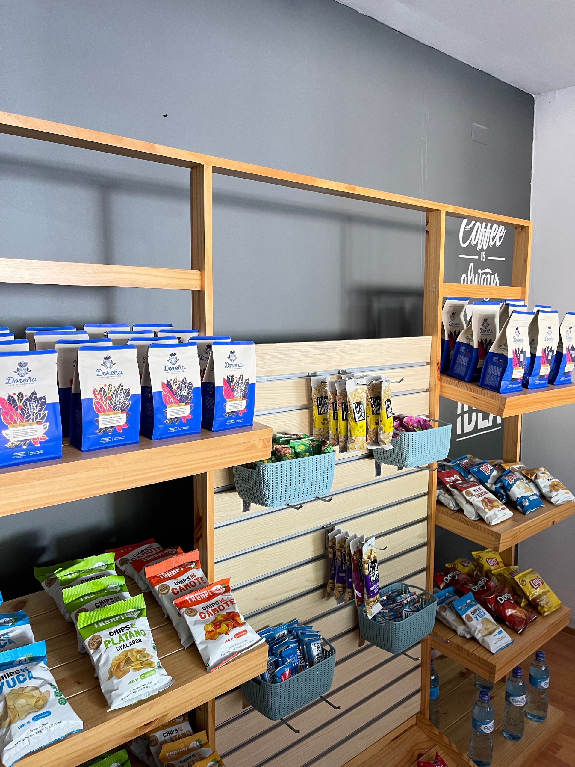 A store filled with lots of snacks and drinks on shelves.