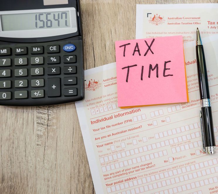 Australian Tax Form, Calculator And Pen — Dynamic Accounting Taxation Advisors in Terrigal, NSW
