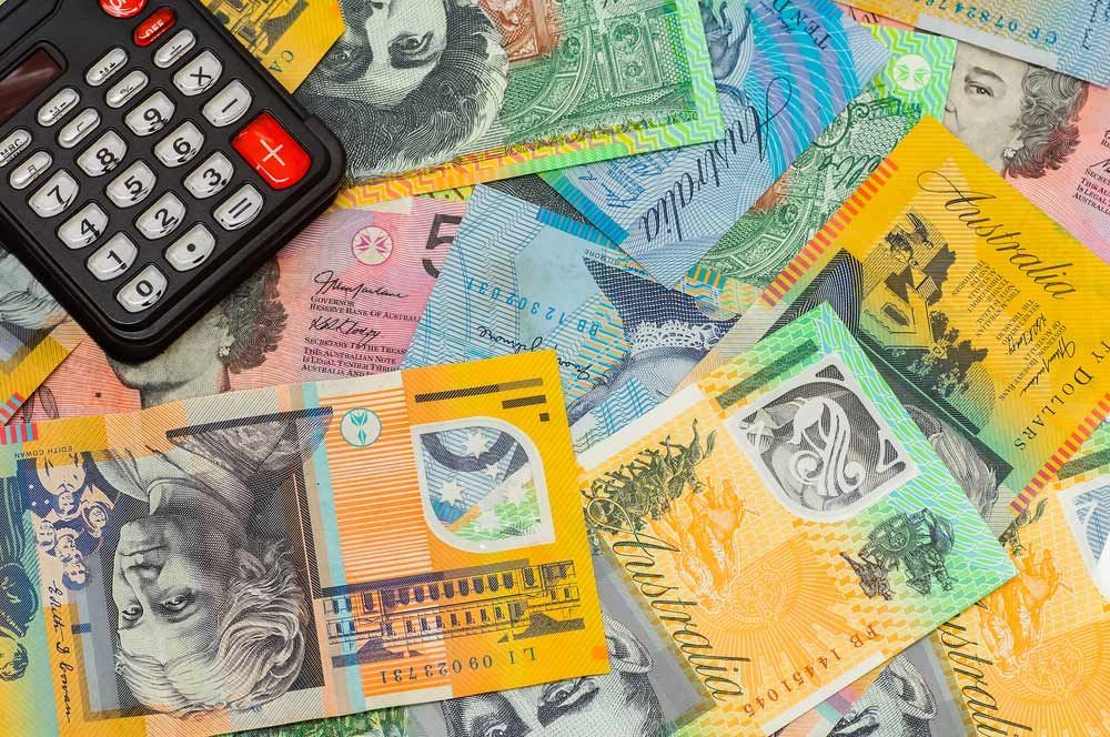 Calculator And Australian Dollar — Dynamic Accounting Taxation Advisors in Lisarow, NSW