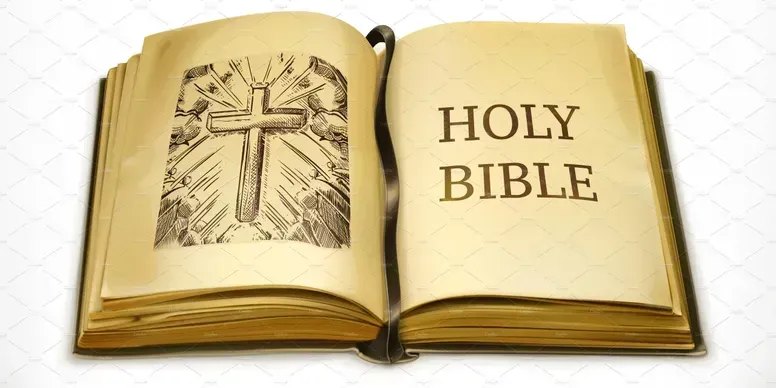 Open Bible displaying a cross illustration and the words 