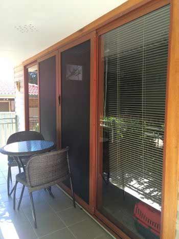 Home Sliding Door with Screen — Jamisontown, NSW — Stained Glass Overlay Penrith