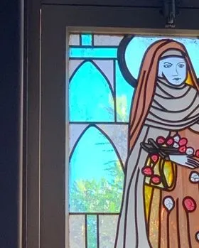 Woman Holding Flowers — Jamisontown, NSW — Stained Glass Overlay Penrith